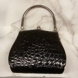 Black faux snakeskin clutch